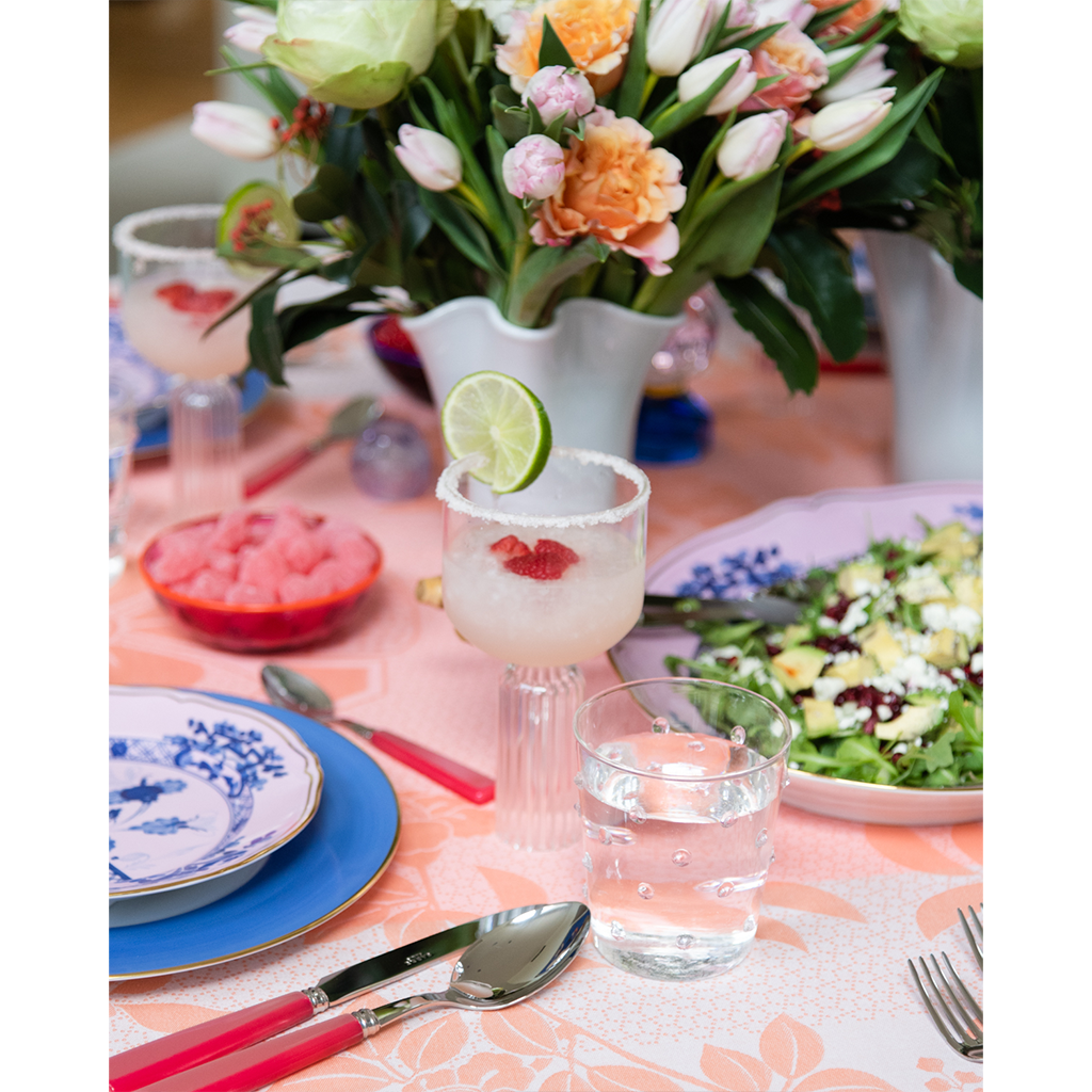 pink dot glass on table