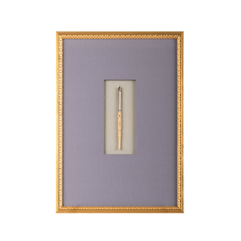 Bone pen with gold frame and natural and purple linen mat