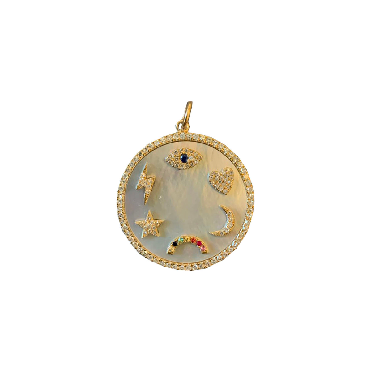 circular golden charm with moon, evil eye, heart, lightning bolt, star, and rainbow designs 