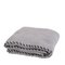 Medium grey blanket with darker grey thick contrasting stitch in the middle