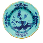 teal plate with navy hand painted designs