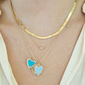Model wearing A Mother's Heart Charm, Turquoise, with heart charm