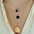 Model wearing Be a Star Charm, Black, on necklace