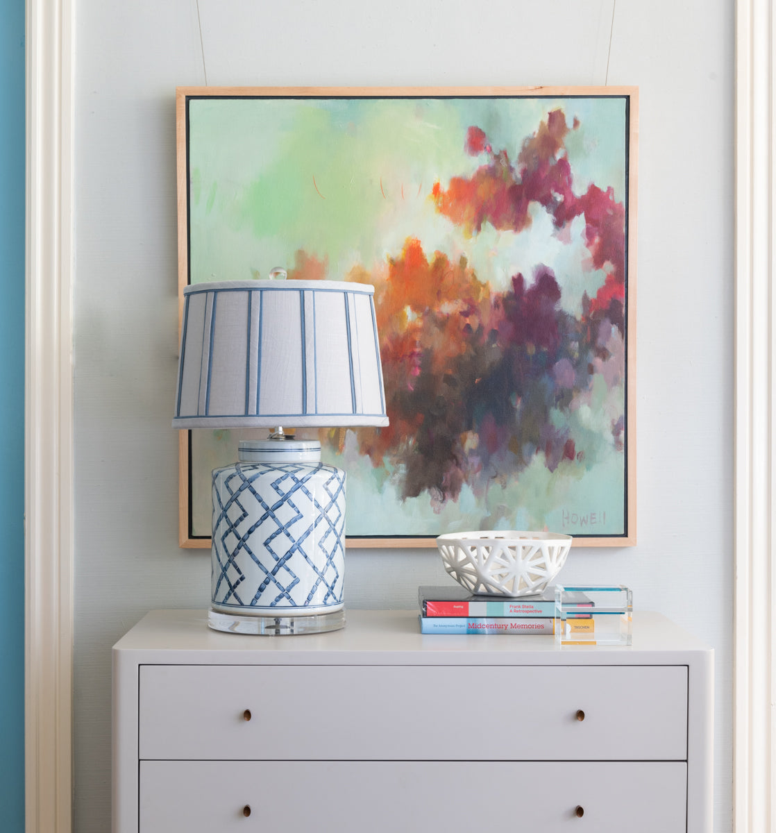 Geometric Bowl displayed on dresser with coffee table books and lamp