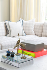 Large Grey Accent Box displayed on top of coffee table in living room