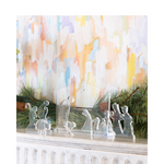 lucite nativity scene styled on mantle 