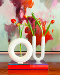 Matte Ceramic Vase - U Shaped displayed on top of coffee table