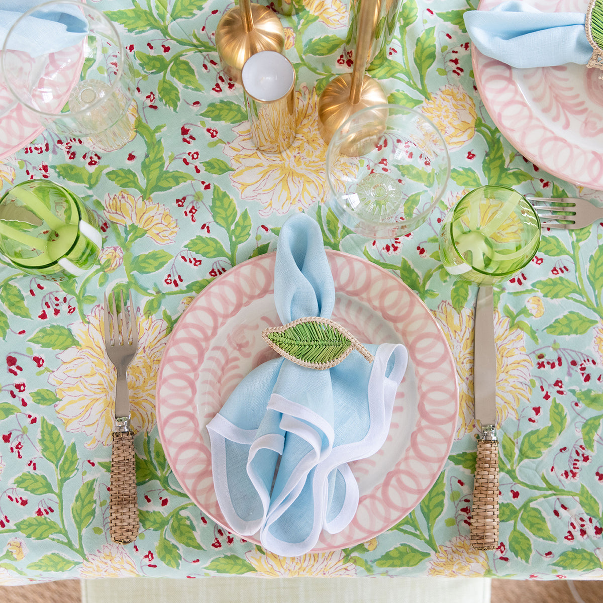 Aerial view of Latesia Tablecloth with dinner plate, flatware, napkin and glassware displayed on top