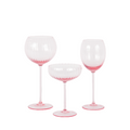 pink white wine, red wine, and champagne glass together