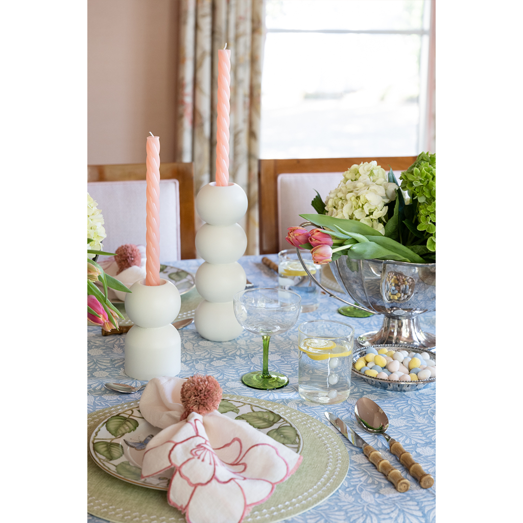 Pink spiral candle styled on tablescape 