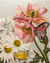art print of pink and white flowers and a pink butterfly, and yellow beatle