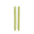 pair of swirled, green taper candles