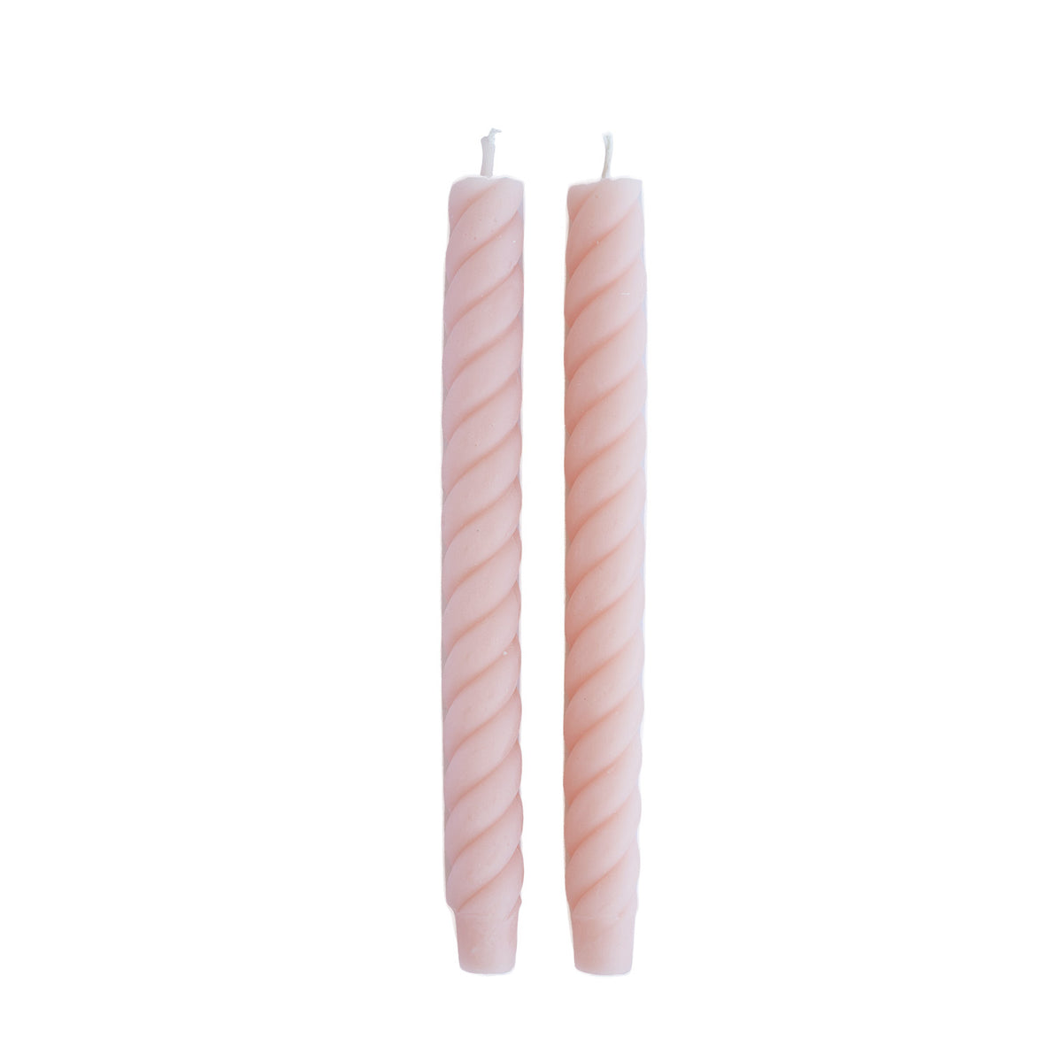 pair of swirled, pink taper candles