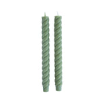 pair of swirled, dark green taper candles