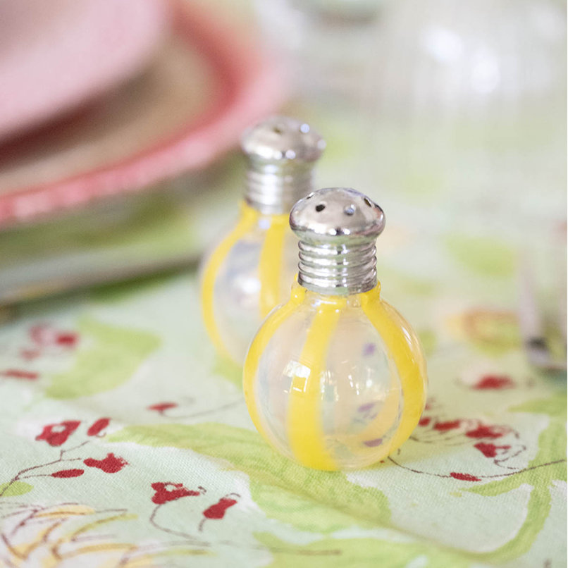 table setting with salt and pepper shakers