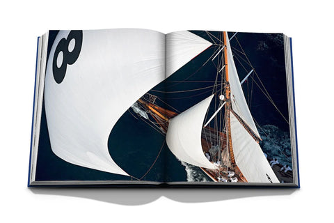 Yachts: The Impossible Collection book open and showing photo of sails from a boat from above