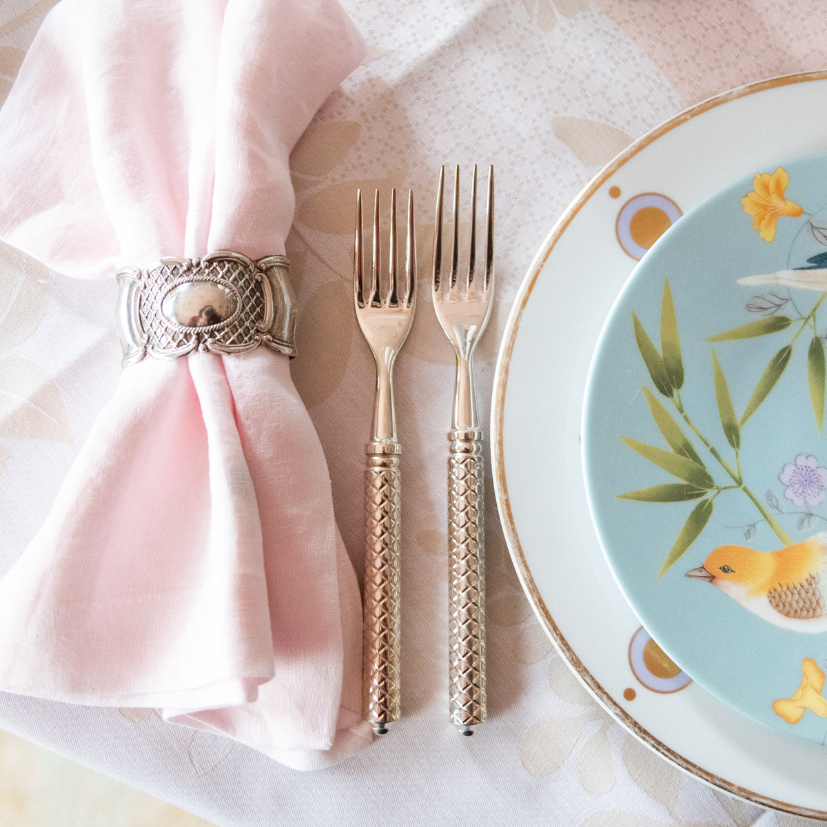 Alain Saint Joanis Damas Silverplate Salad Fork and Dinner Fork displayed on tablecloth with dinner plate, bowl and napkin