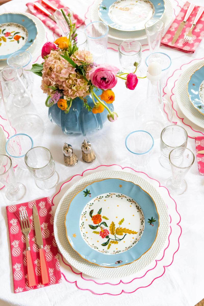 Full view of Opaque Blue Rounded Vase in Large with tablescape display