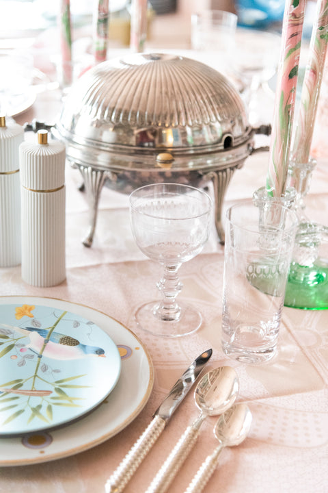 Daphne Highball paired with wine glass on tablecloth with tablescape setting