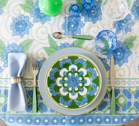 Birds Eye View of Klimt Flower Tablecloth with napkin, flatware, dinner plate, accent plate and glassware on top