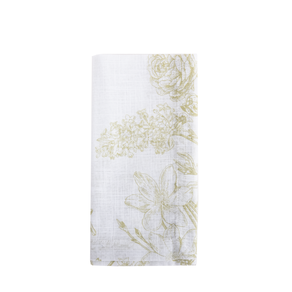 A white cloth napkin with subtle green floral patterns.