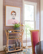 Brenda Bogart Twiggy hanging on wall above a bar cart