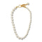 pearl necklace with half larger pearls and half smaller pearls with gold hook clasp