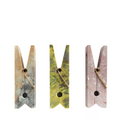 green, grey, and pink extra large stone clothespin together